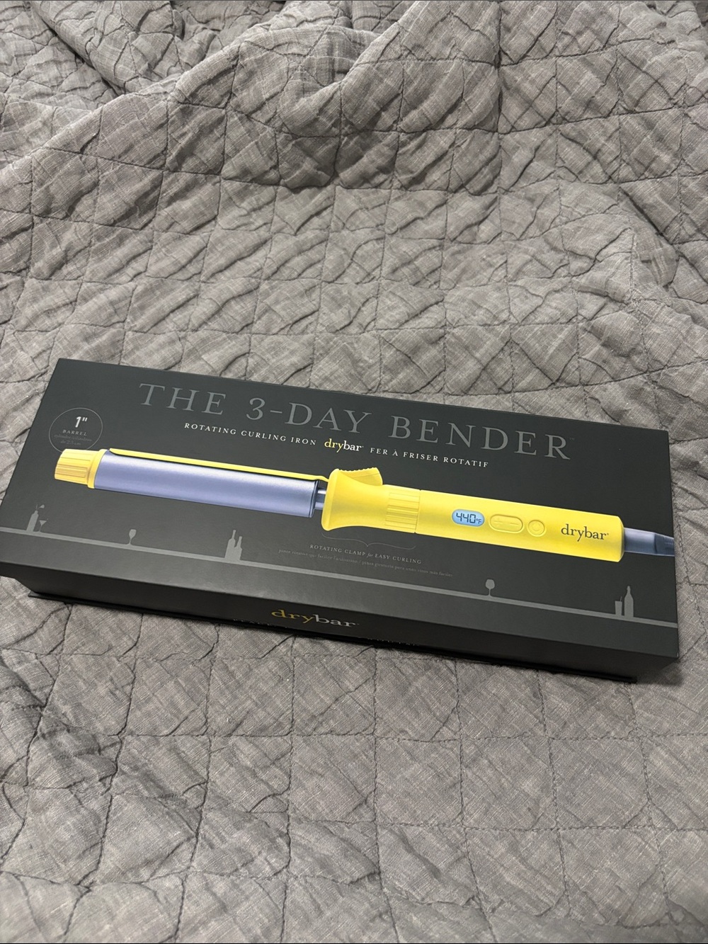 Drybar rotating curling iron in yellow and gray